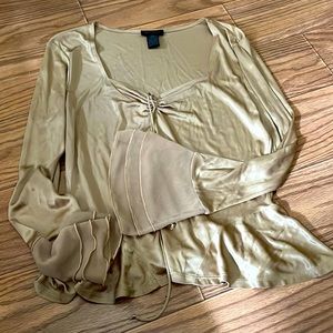 Tan ruffled blouse